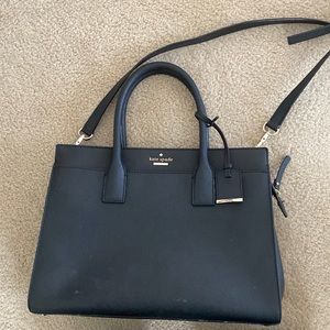 Kate Spade purse with crossbody attachment and drop handles.